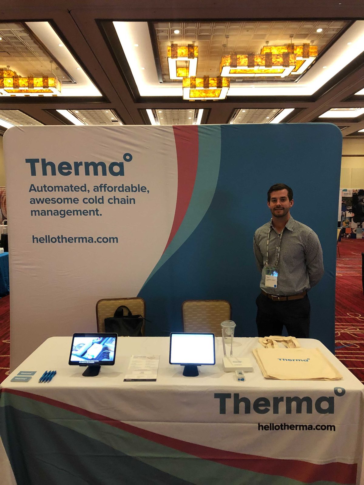 Tom Loebenstein working the Therma booth alone at a trade show.